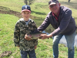 Even this little guy managed to reel in a 5lb rainbow trout from the dam! Unfortunately, we couldn't get him to hold it though!