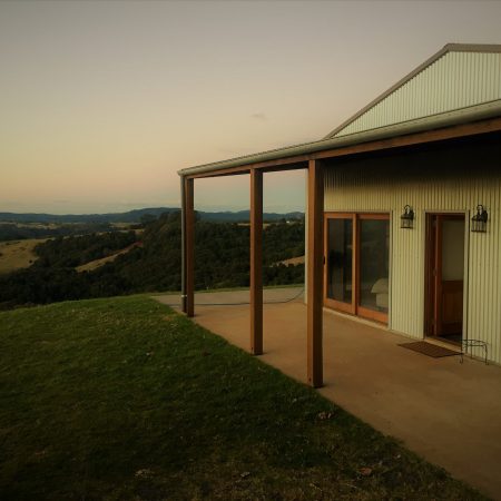 front of house on a hill